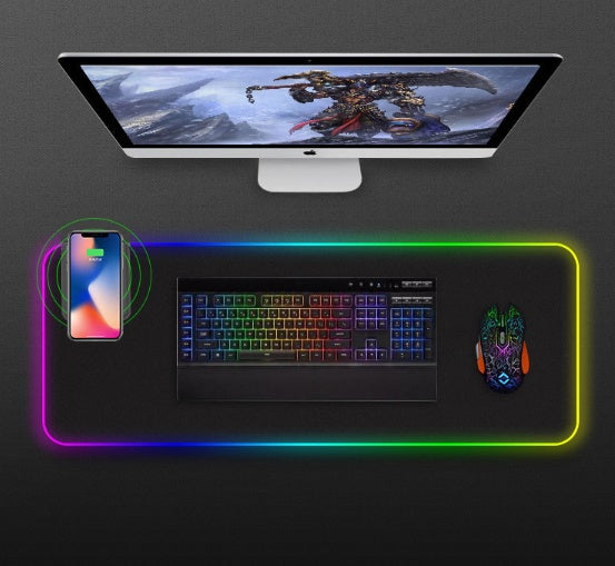 Wireless charger with colorful RGB glowing LED light on a FLIPSTYLEZLLC mouse pad, illuminated and vibrant in a sleek setup