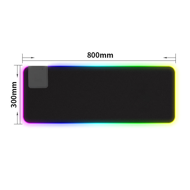 Wireless charger with colorful RGB LED glow on a FLIPSTYLEZLLC mouse pad, featuring a sleek illuminated surface.