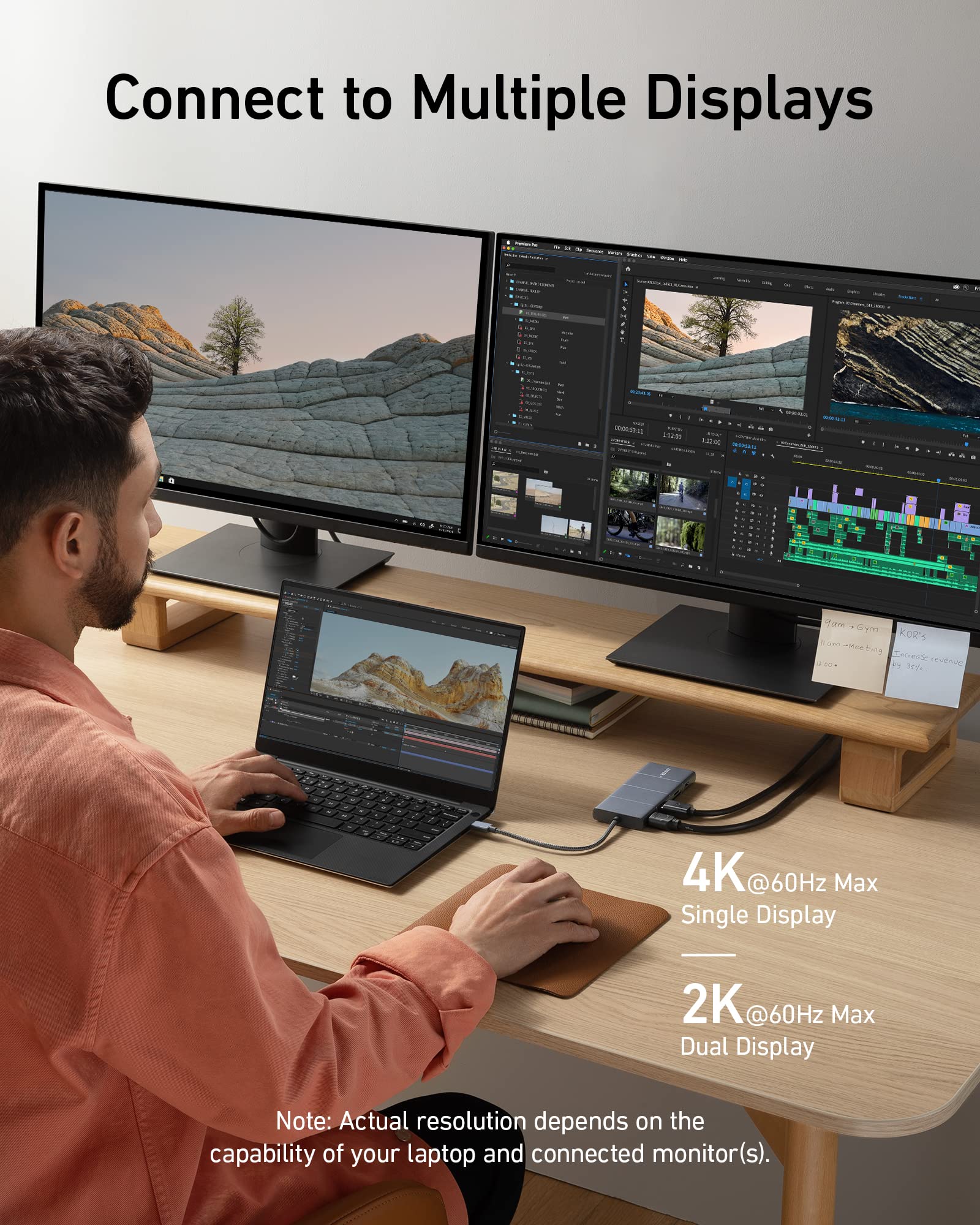 Anker 565 USB-C Hub with dual display ports and 100W charging, showing the sleek hub connected to a laptop.