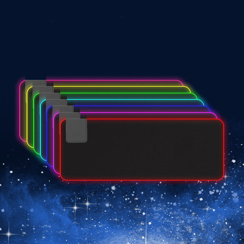 Wireless charger LED mouse pad with colorful RGB glow, smooth surface, and charging area by FLIPSTYLEZLLC.